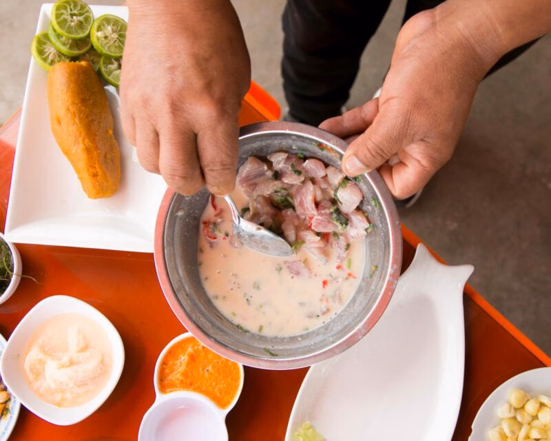 Luxury Peru Tours - A man making ceviche in Peru