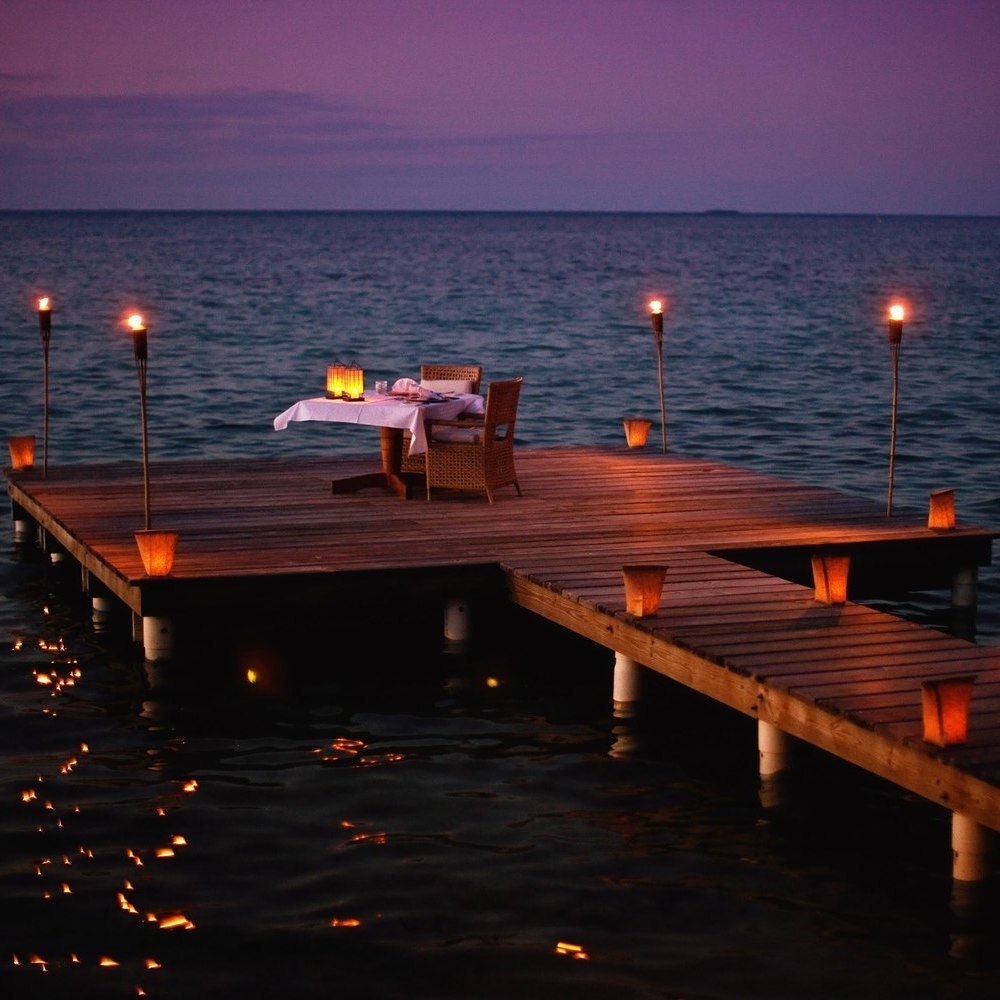 The private dining experience on Cayo Espanto, on a villa's private dock.