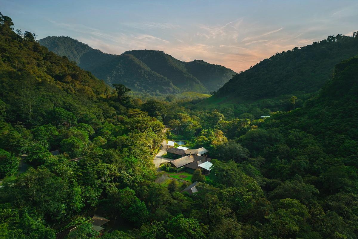 An aerial of El Silencio in Costa Rica with mountains surrounding the hotel on all sides.