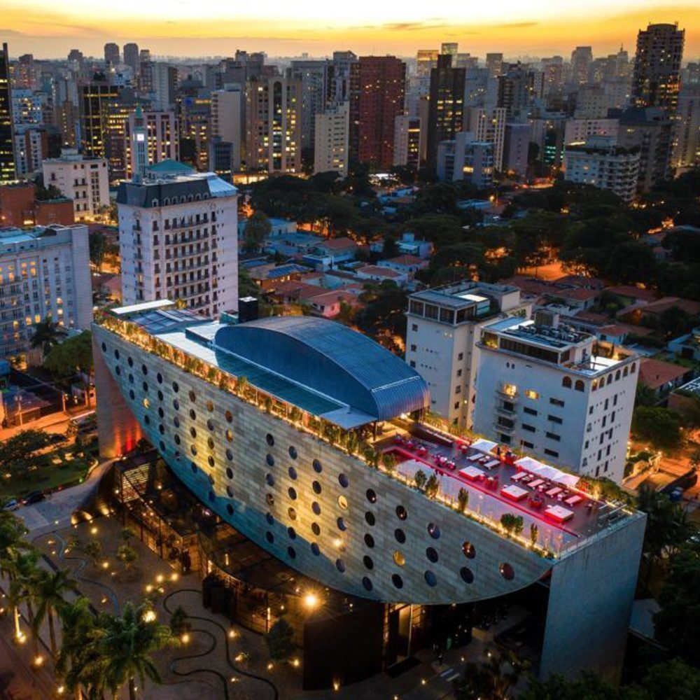 Aerial view of Hotel Unique at sunset