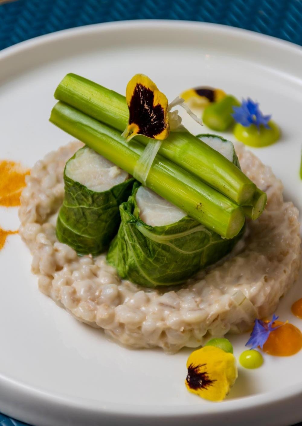 A close up of an artfully presented dish at La Selva Lodge .