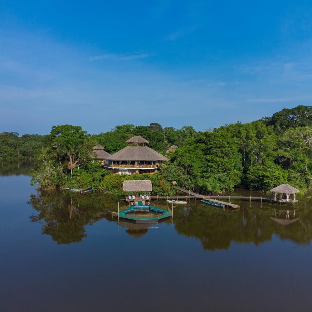 The exterior of La Selva Lodge which sits on a lagoon.