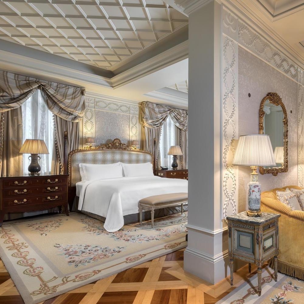 A suite bedroom at Hotel Grande Bretagne
