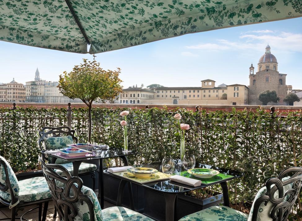The roof terrace of the St Regis hotel in Florence, showing views over the city