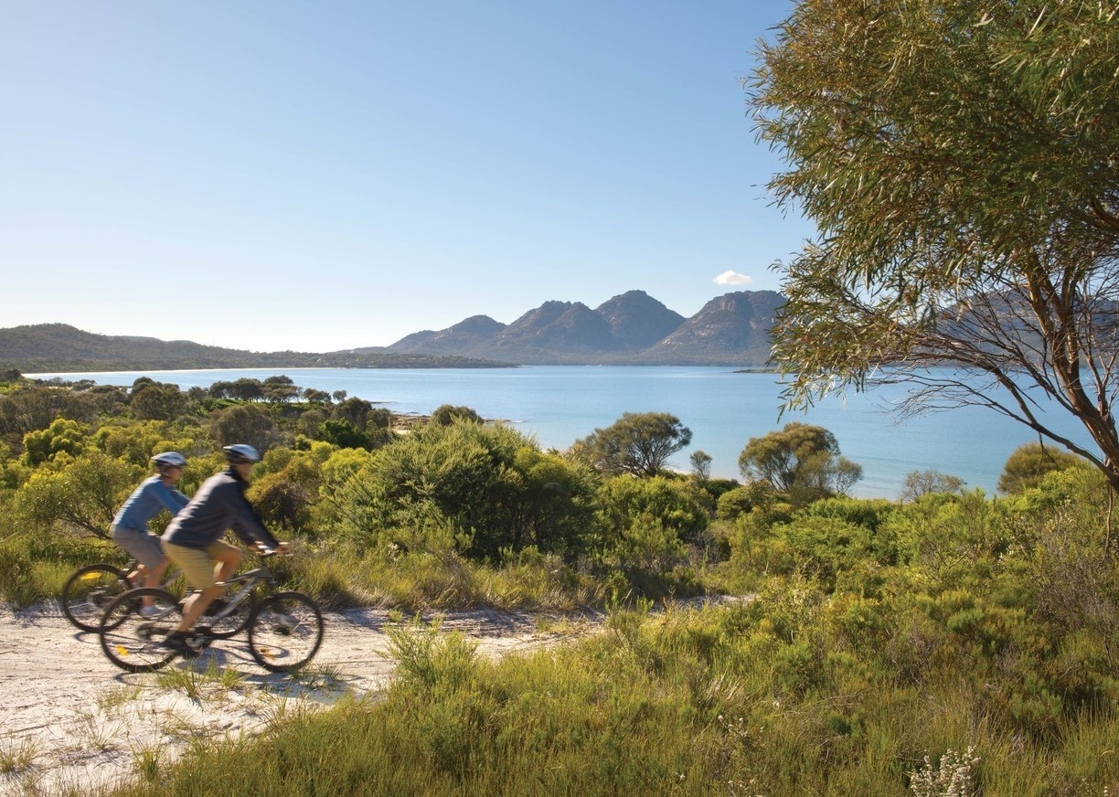 Mountain bike riding by the water at Saffire Freycinet