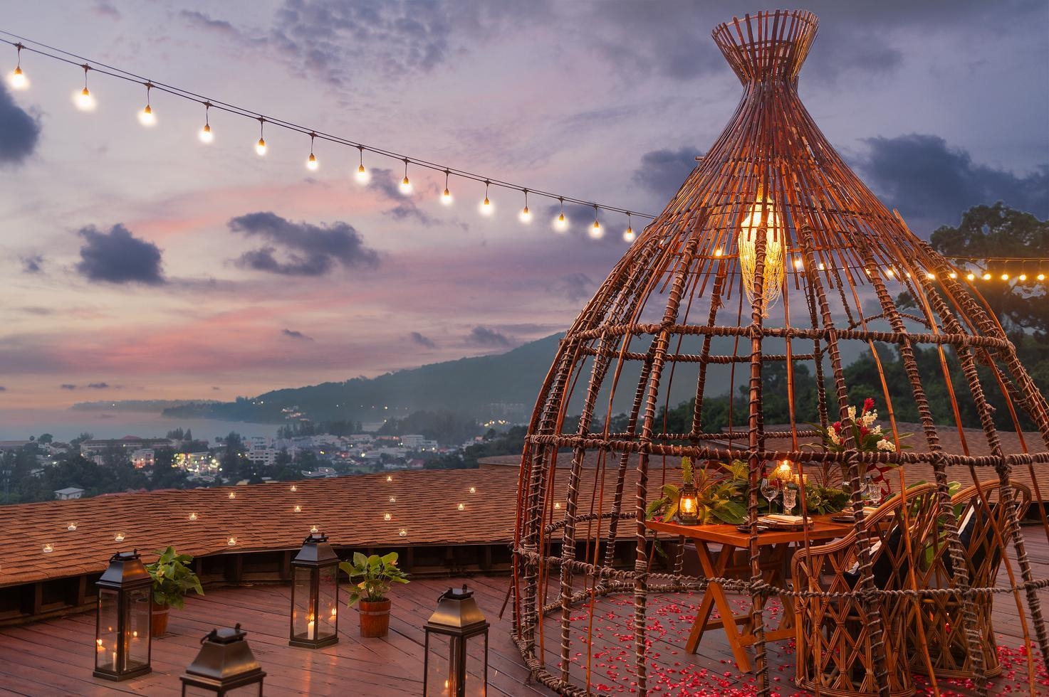 A dining area set up for two on the rooftop at Keemala.
