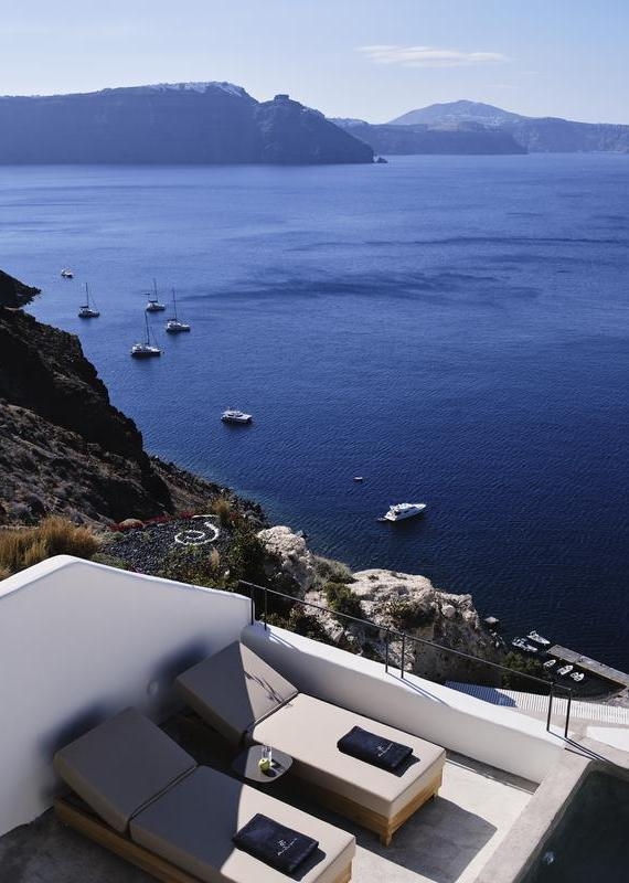 View of balcony and the sea at Andronis Luxury Suites