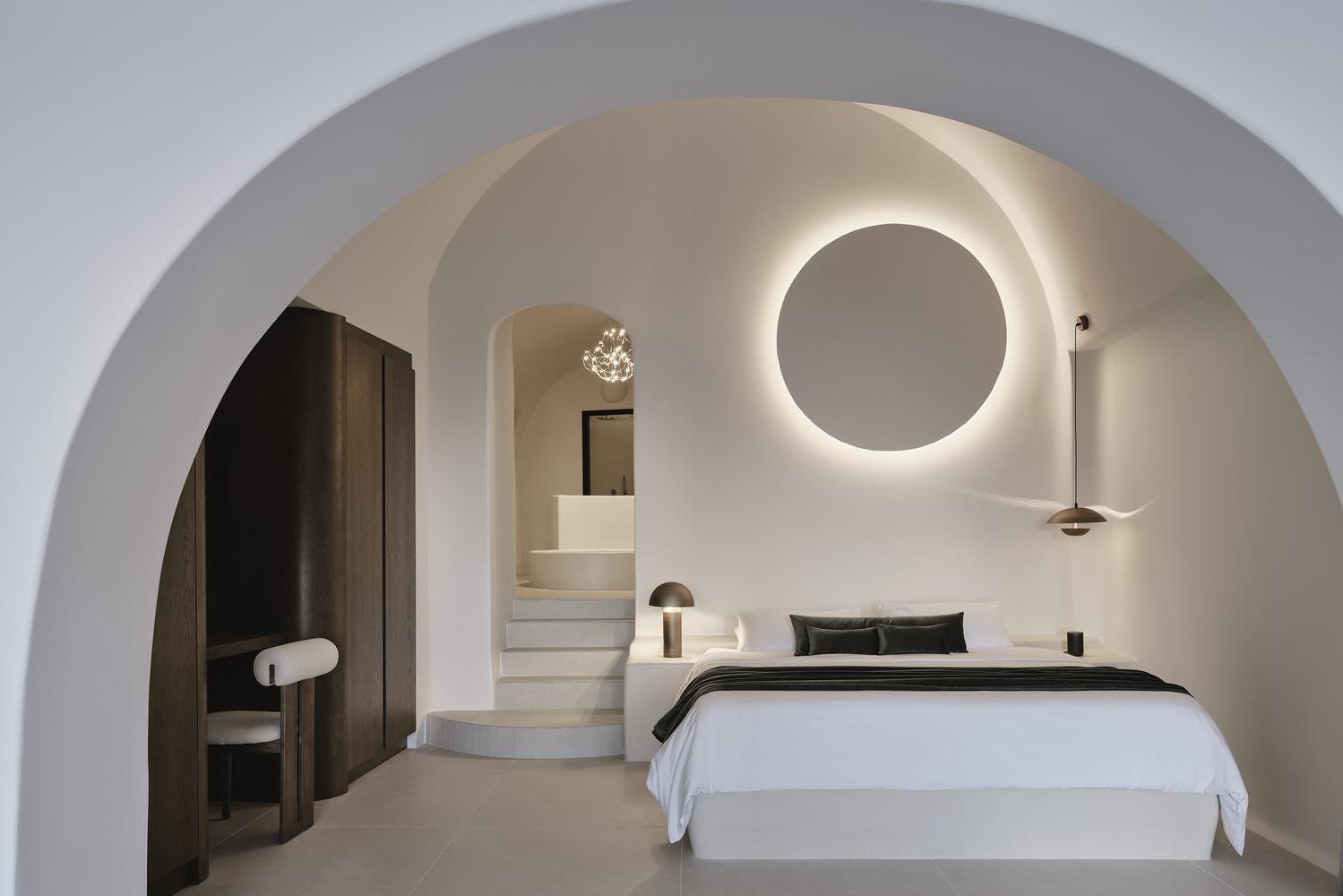 A white bedroom at Andronis Luxury Suites