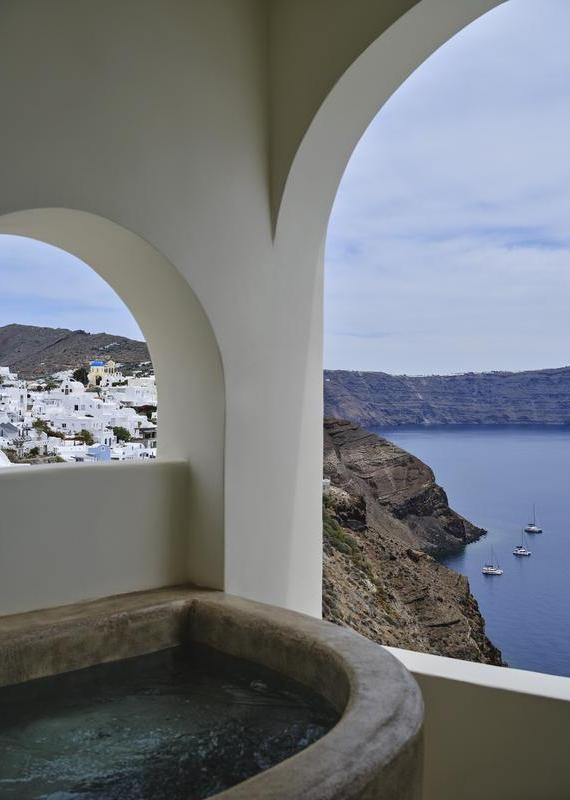 Plunge pool with clifftop and ocean views at Andronis Luxury Suites