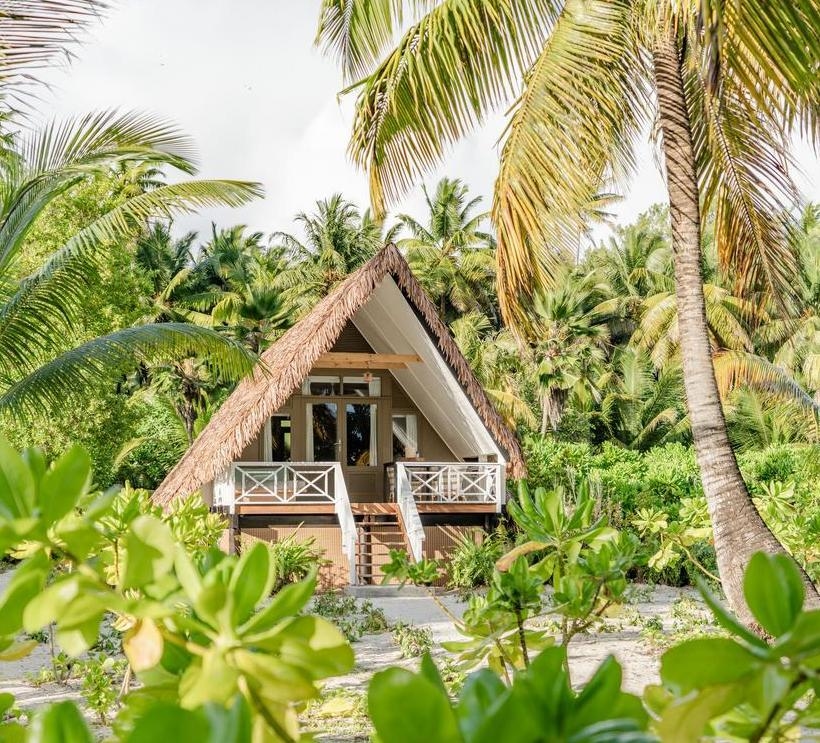 A view of the exterior of one of Alphonse Island's beach bungalows.