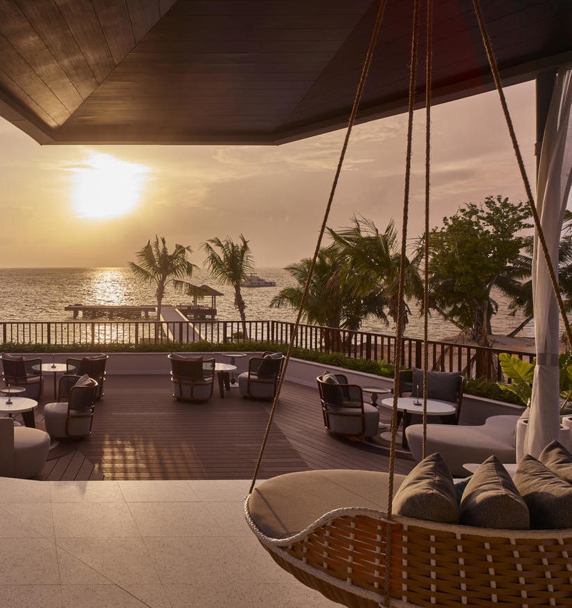 Lalin's seating area at sunset at Waldorf Astoria Seychelles Platte Island