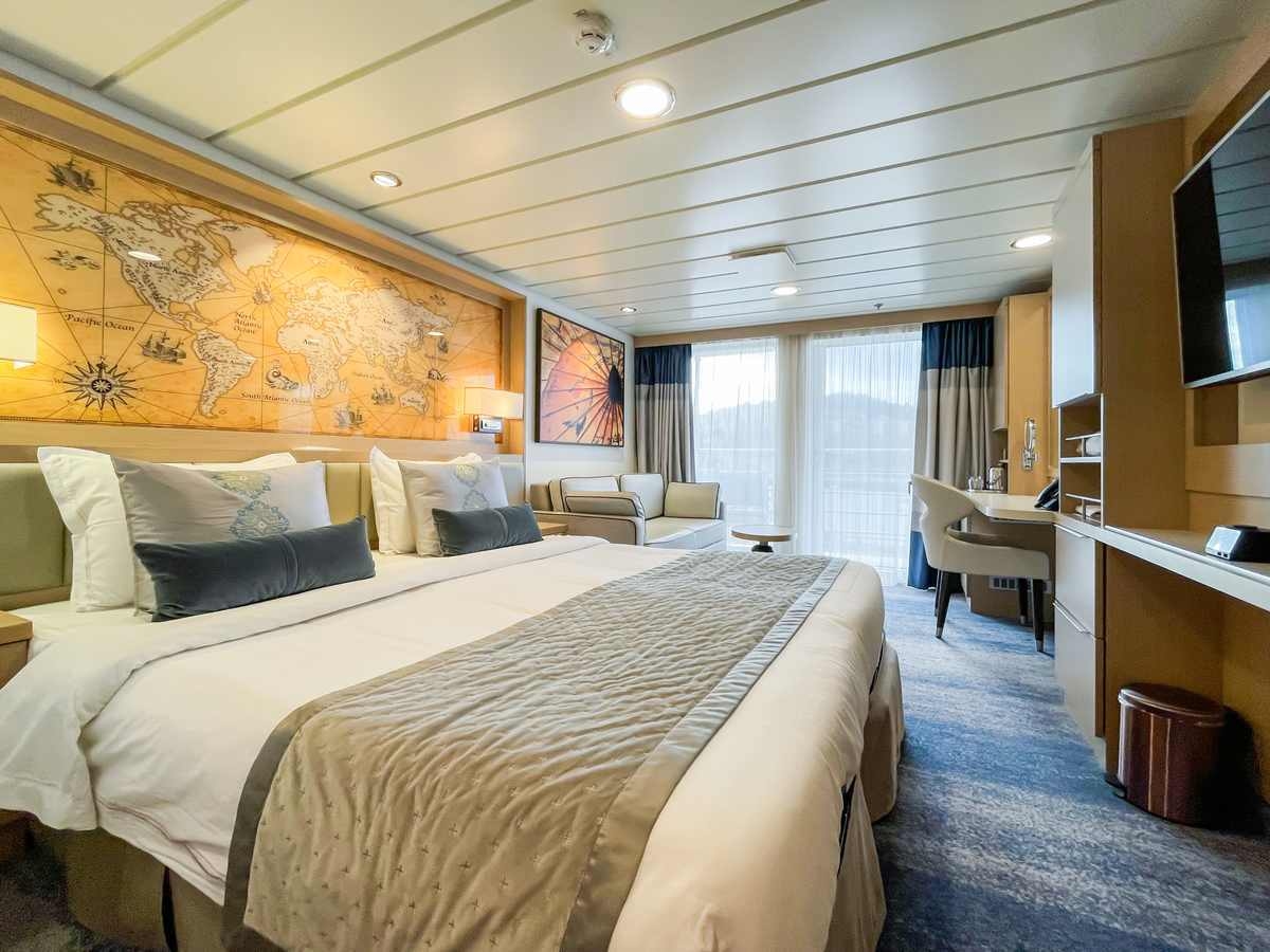 One of the Ocean Explorer's elegantly styled cabins that opens out to a veranda.