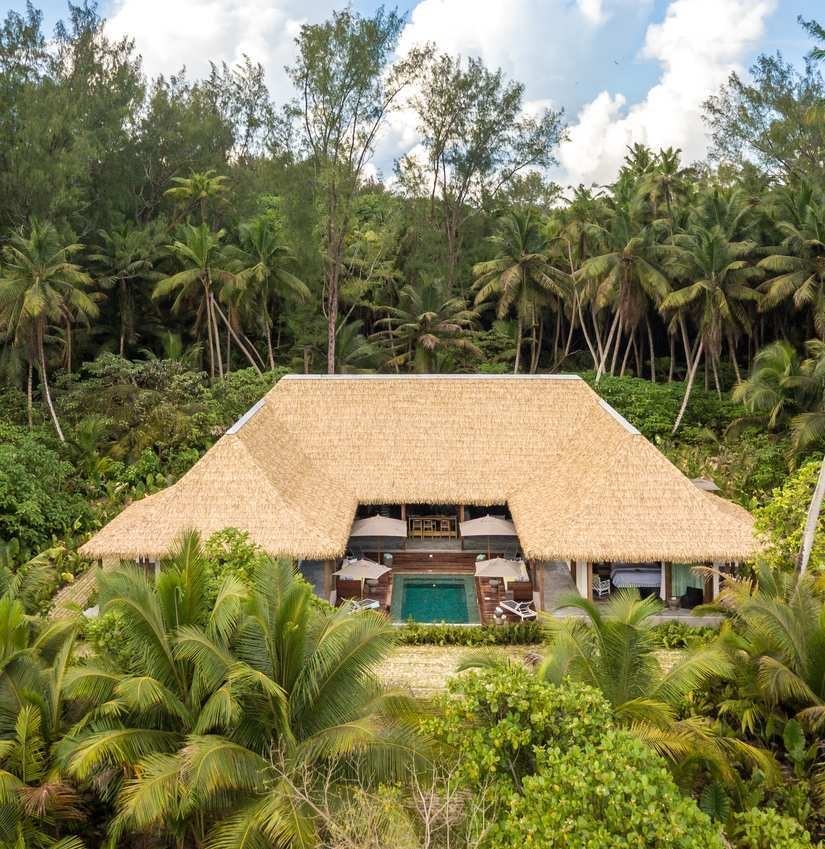 An aerial view of a beach retreat on Alphonse Island.