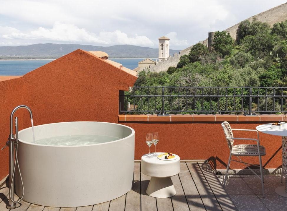 Outdoor bathroom at La Roqqa with freestanding tub.