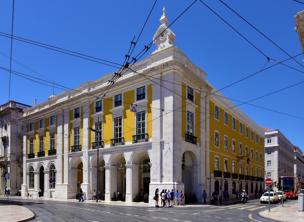 The yellow exterior of Pousada de Lisboa in Lisbon