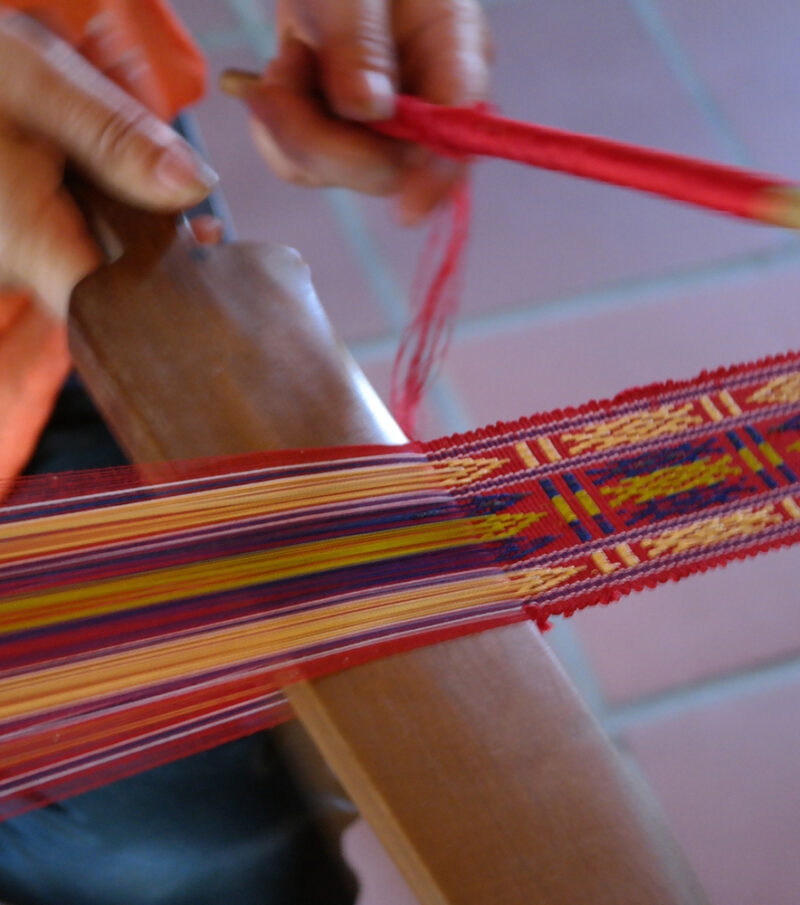 Luxury Vietnam Tours - Close up of silk weaving by hand