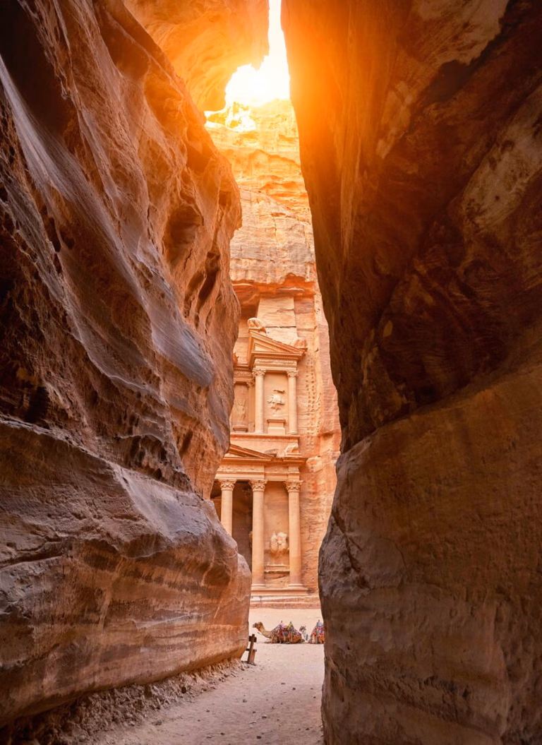 The Treasury Al Khazneh carved into rose sandstone at Petra
