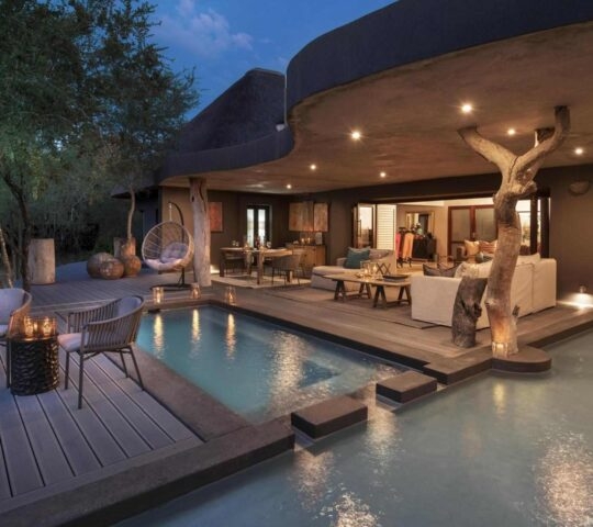 The exterior of Chitwa House at Chitwa Chitwa, showcasing its terrace area with a private pool.