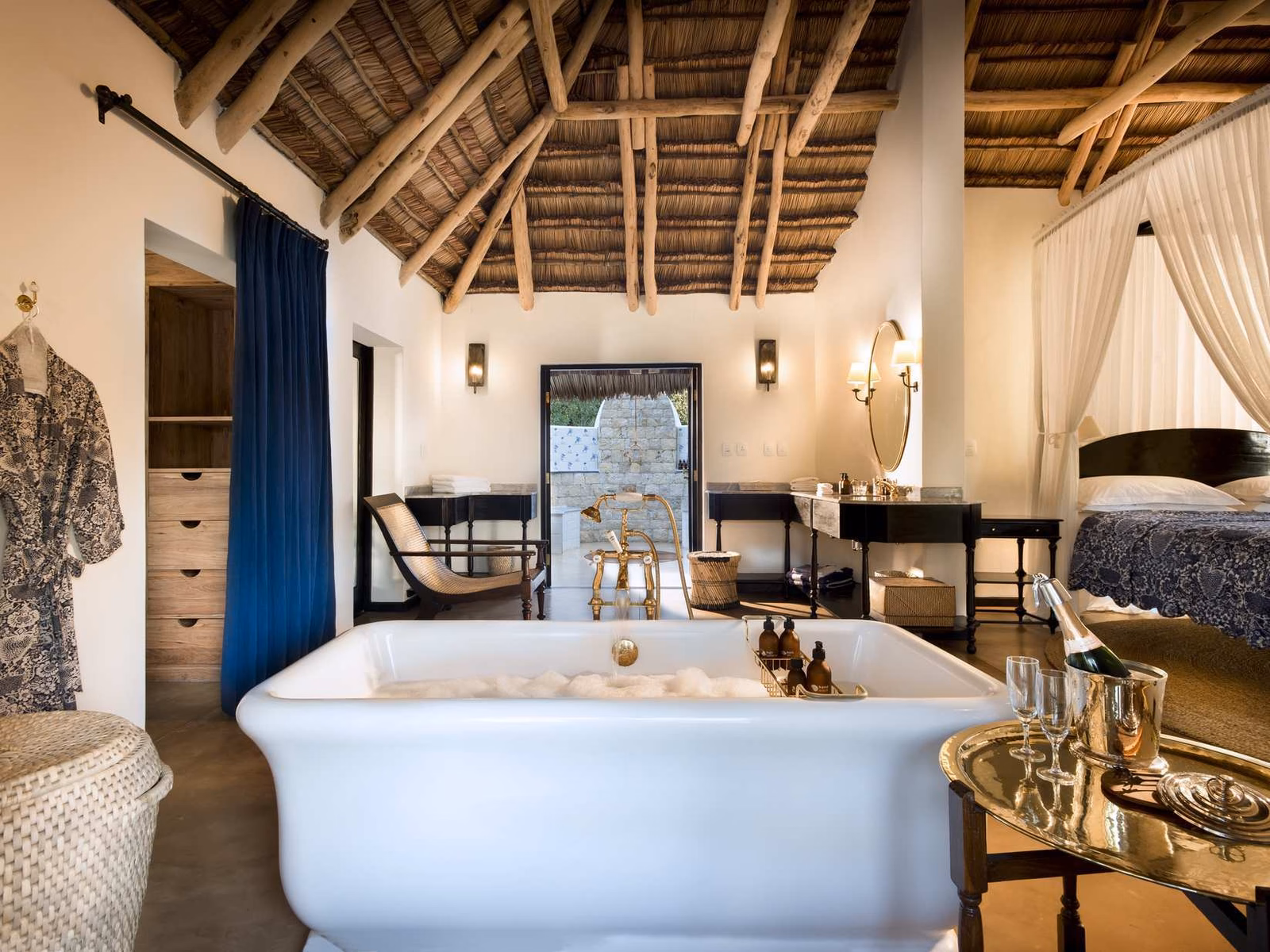 The indoor bathtub of a casita or villa of andBeyond Benguerra Island. It's old-fashioned in style.