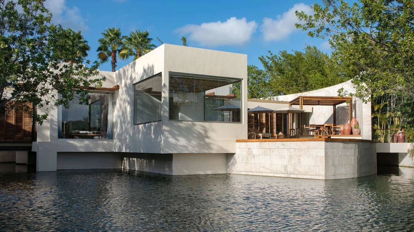 An exterior shot of Rosewood Mayakoba's presidential suite with a modern architectural design.