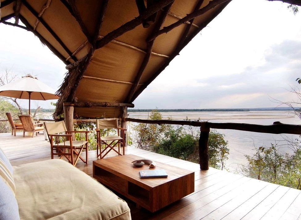 One of Sand Rivers' open-fronted bedrooms with a private veranda overlooking the Rufiji River.