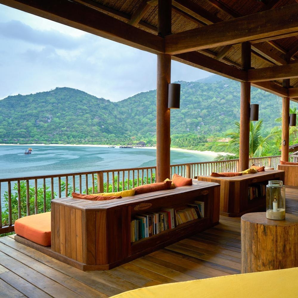 Seating area for drinks with view of the water at Six Senses Ninh Van Bay
