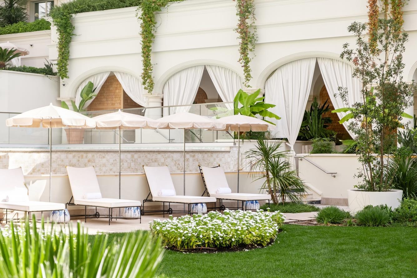 Sun loungers at the pool area of Carlton Cannes.