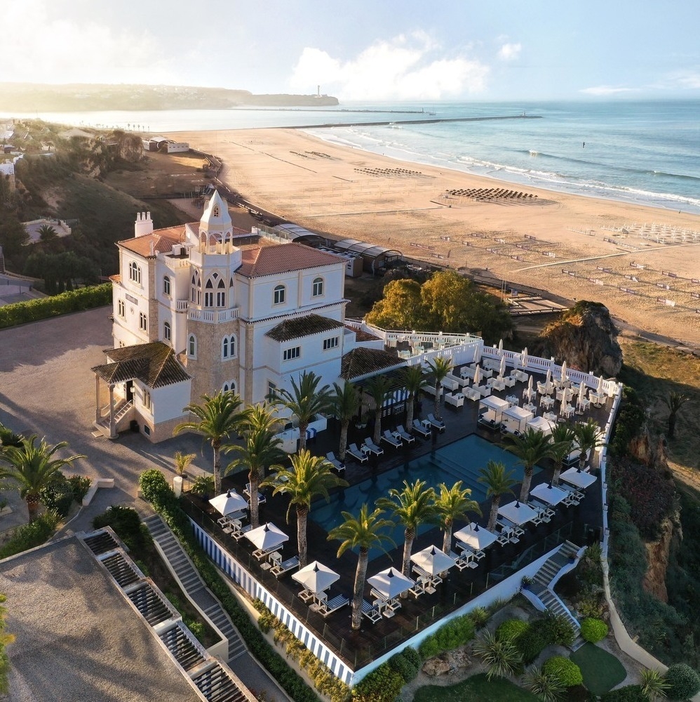 Aerial view of Hotel Bela Vista with the beach in the background