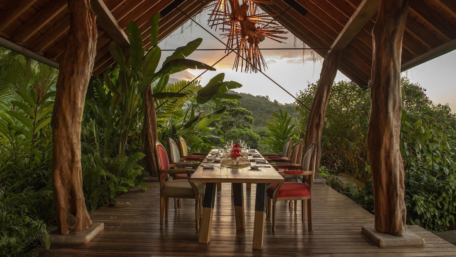 Outdoor dining area at Origins Lodge, Costa Rica