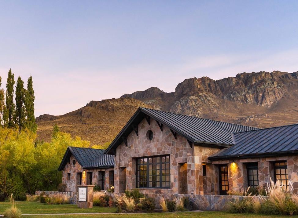 View of the main lodge at Explora Patagonia National Park in Chile in warm lighting