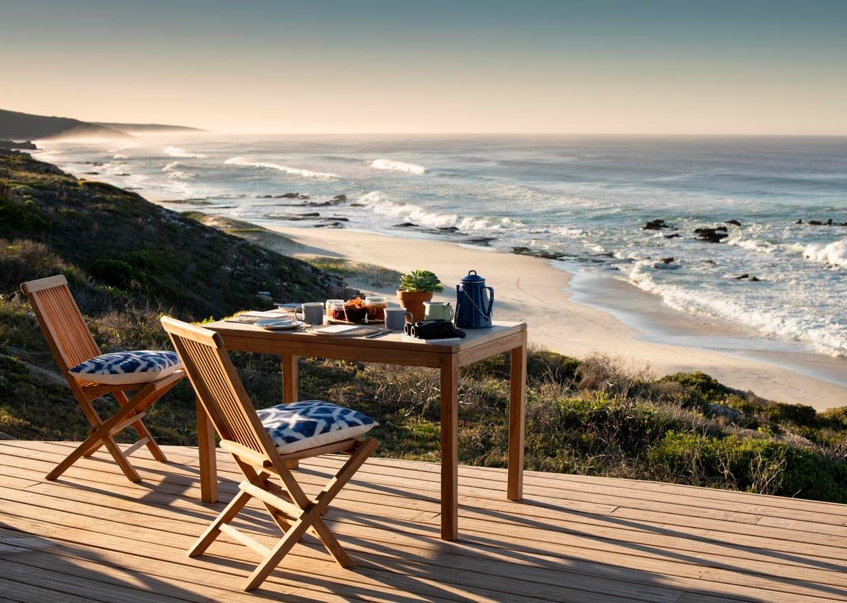 Outdoor dining on the terrace at Lekkerwater Beach Lodge, South Africa