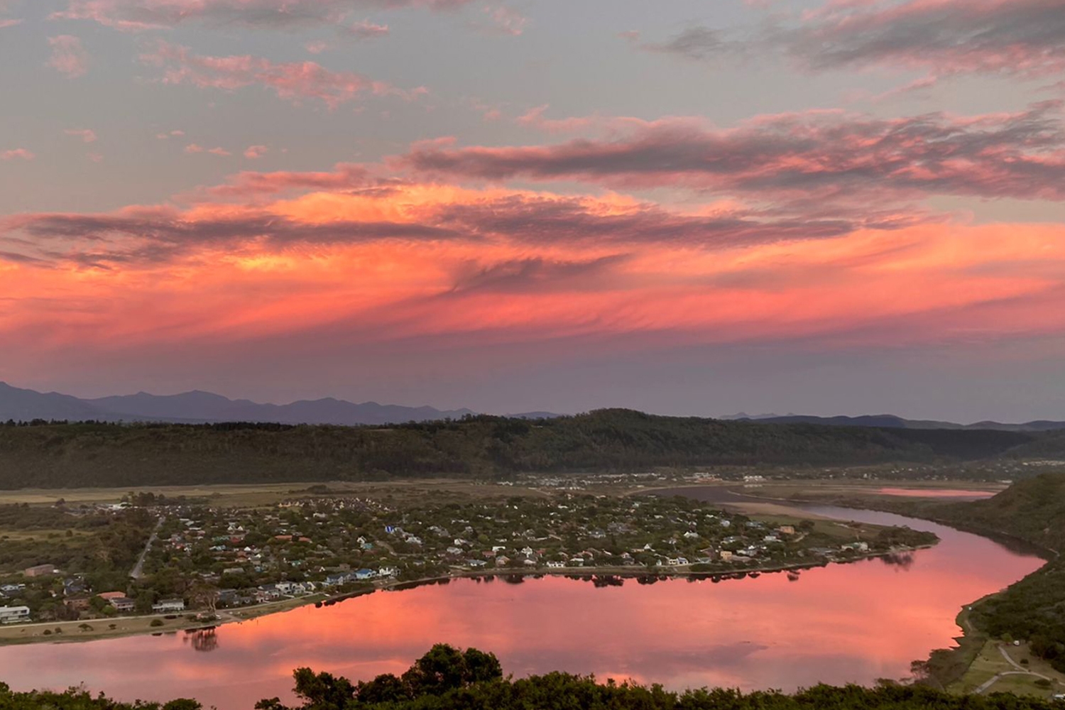 Sunrise over the water at Simbavati Fynbos on Sea
