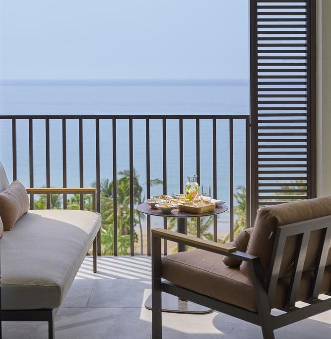 The sea-facing terrace of a sea-view room at the Mandarin Oriental Muscat.