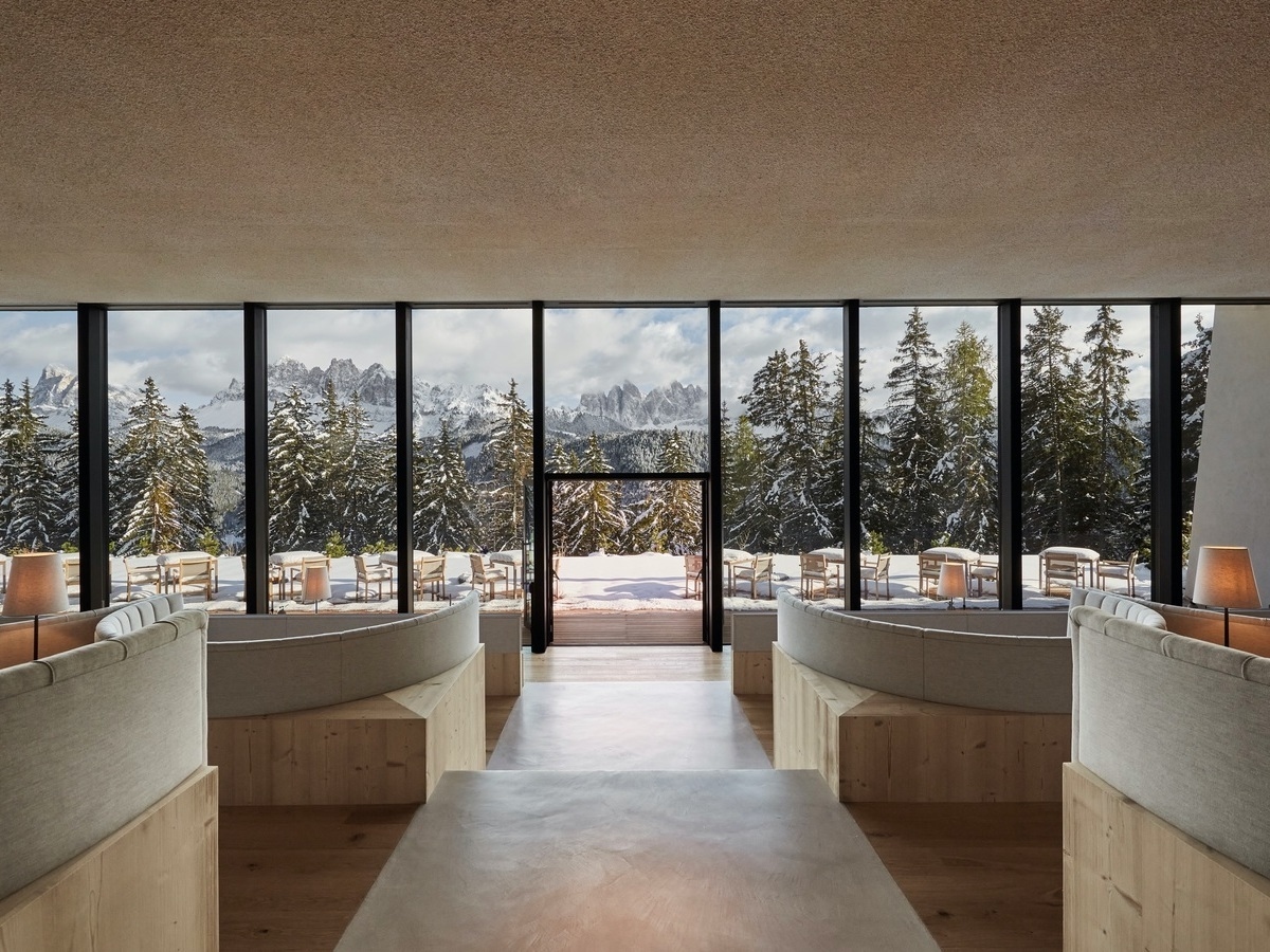 Restaurant tables with mountain views at Forestis Dolomites