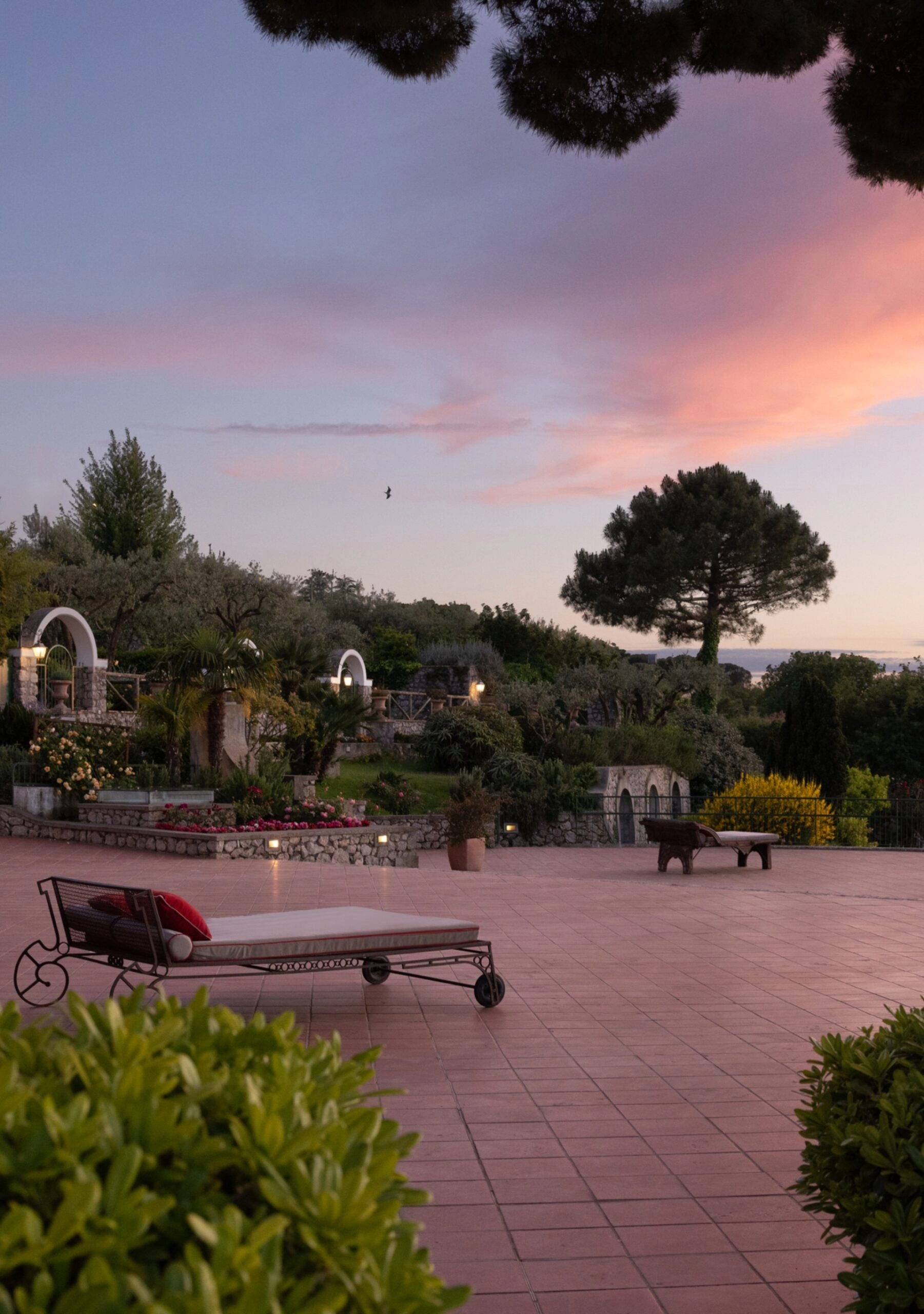 Hotel Caesar Augustus's outdoor terrace at sunset.