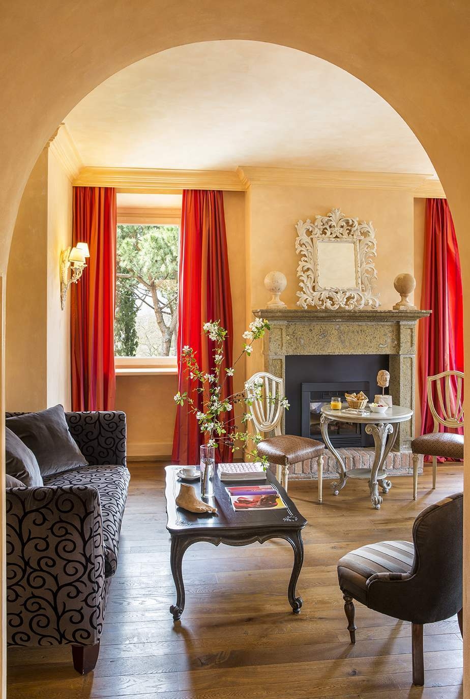The lounge area of a suite at L’Andana Tenuta La Badiola.