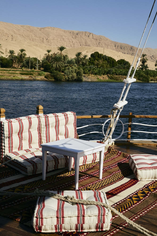 The outdoor seating area of the Lotus dahabiya from Lazuli.