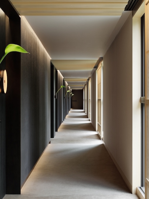 Long corridor with dim lighting and minimalist design