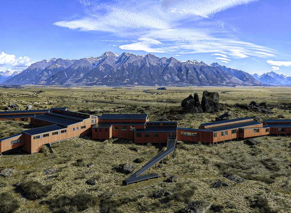 An aerial of Explora El Calafate overlooking the Andes and Patagonian steppe.