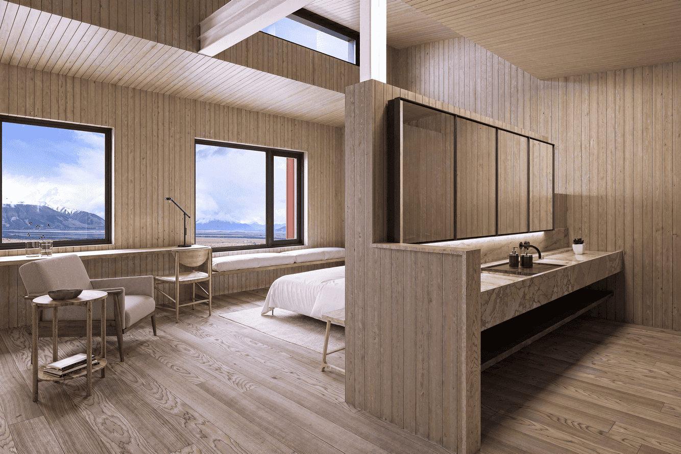 A room at Explora El Calafate featuring neutral wood panels and a picture window overlooking the Patagonian landscape.