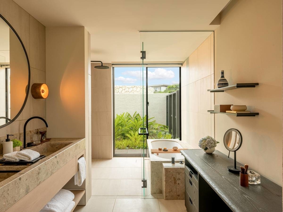 The bathroom in a villa at Rosewood Miyakojima