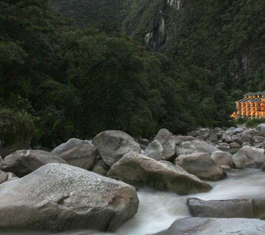 Flowing water of the river near Sumaq taken on a slow shutter speed capturing a ghostly air to the water, Machu Picchu, Peru