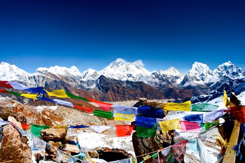 Mount Everest - also called Qomolangma Peak, Mount Sagarmatha, Chajamlungma (Limbu), Zhumulangma Peak or Mount Chomolungma - is the highest mountain on Earth, and the highest point on the Earth's continental crust, as measured by the height above sea level of its summit, 8,848 metres (29,029 ft). The mountain, which is part of the Himalaya range in Asia, is located on the border between Sagarmatha Zone, Nepal, and Tibet, China.