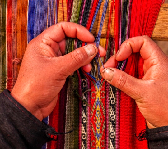 Peruvian woman weaving, The Sacred Valley, Chinchero