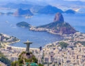 Aerial view of the Christ, The Redeemer Monument and the Corcovado Mountain in Rio de Janeiro, Brazil. One of the Seven Wonders of the World the monument is a must-go spot do travelers upon visiting Rio. Along with the beautiful statue the view of the Corcovado is breathtaking with the Sugarloaf Mountain and the Botafogo Bay among some of the places you can see from up there.