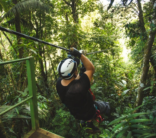 Zip-liner in the Costa Rica rainforest.