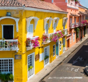 Colorful buildings in a street of the old city of Cartagena (Cartagena de Indias) in Colombia, South America