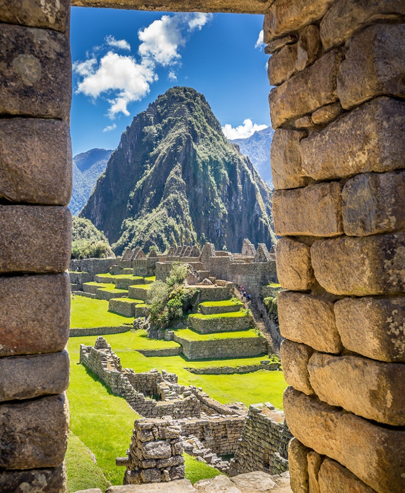 View of Machu Picchu through stone doorway
