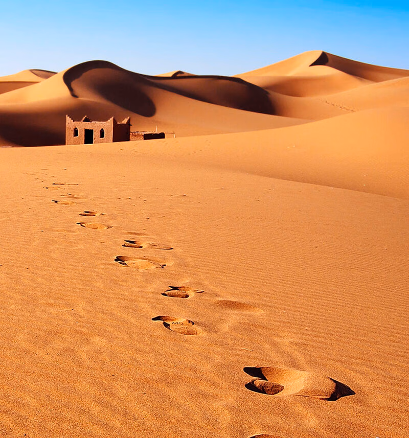 Sand dunes with footprints