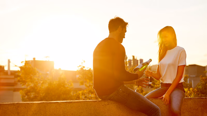 Sharing bubbles on their balcony